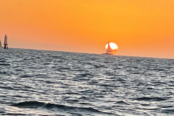 a sunset over a body of water