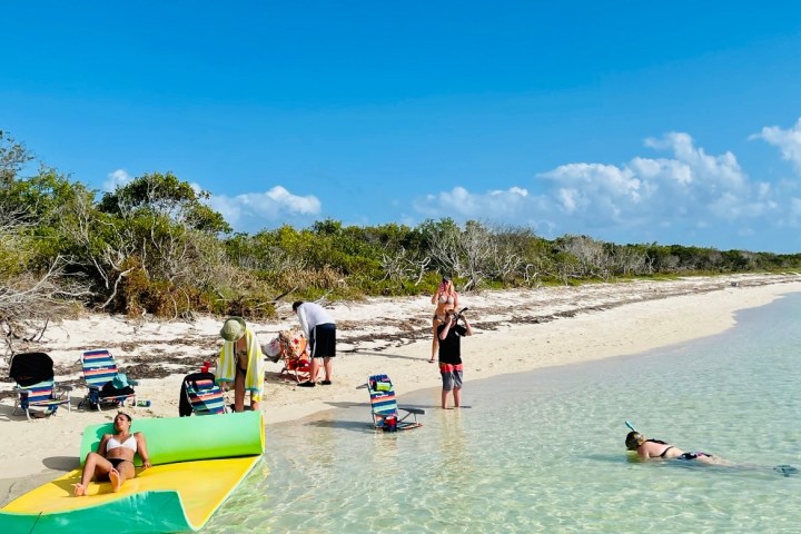 a group of people on a beach